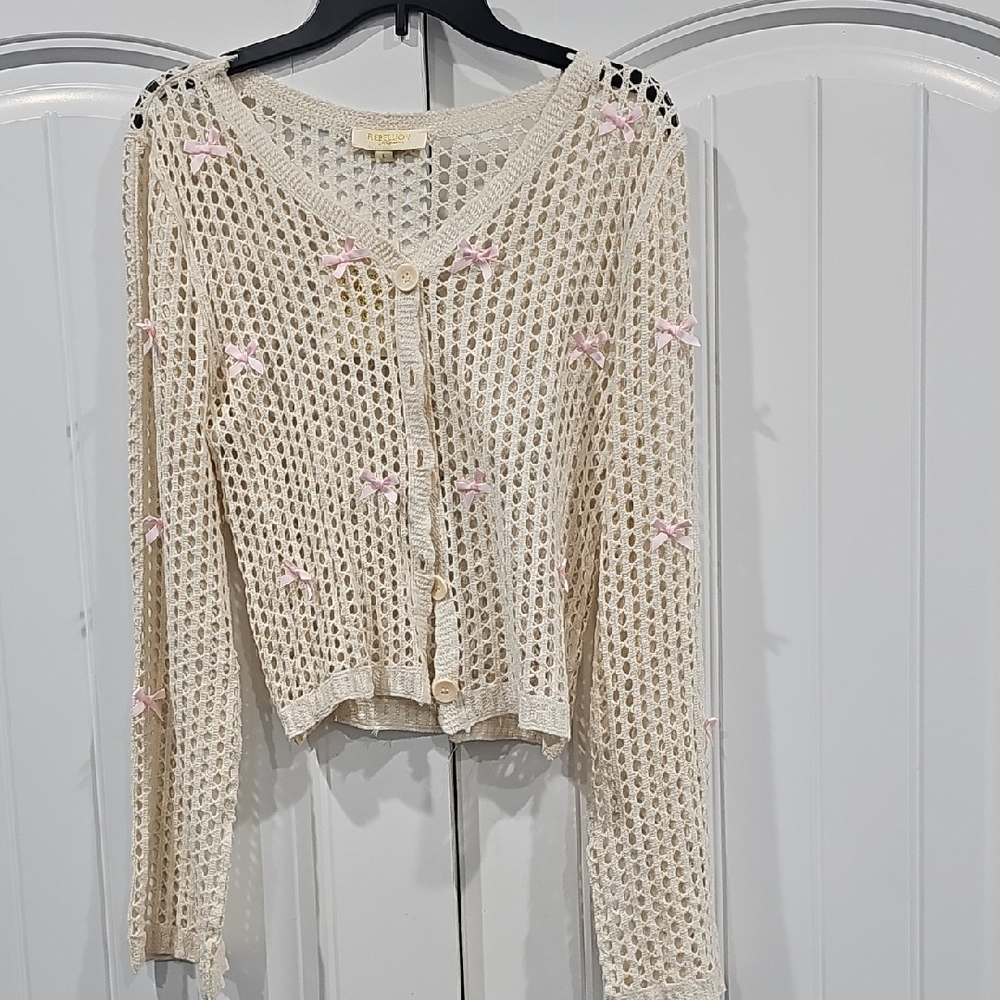 Rebellion Cream Open-Knit Cardigan with Pink Bow Details